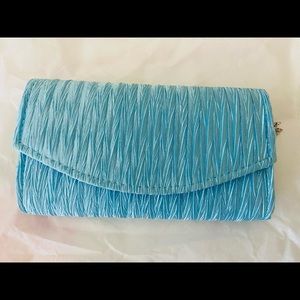 New light blue evening clutch